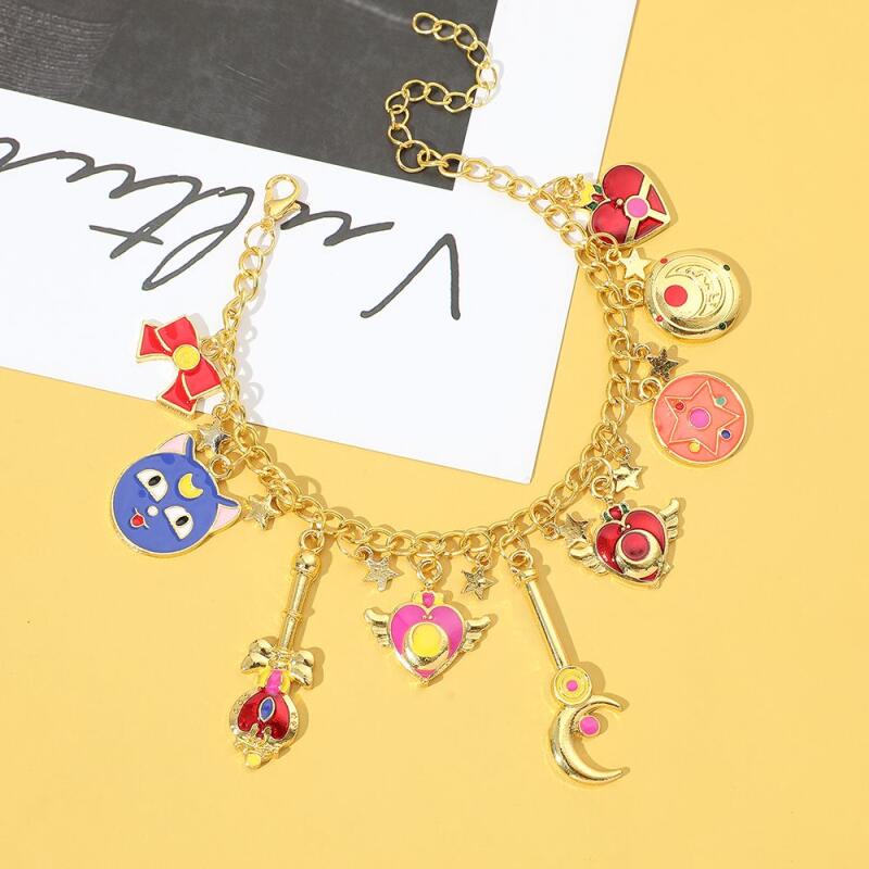 Sailor Moon Wand - สินค้าอนิเมะญี่ปุ่น สร้อยข้อมือโลหะเซเลอร์มูน ไม้กายสิทธิ์รูปดาว กระเป๋าตกแต่งซิป ของขวัญเทศกาล